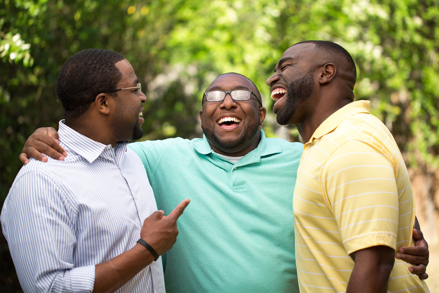 group of men talking and laughing